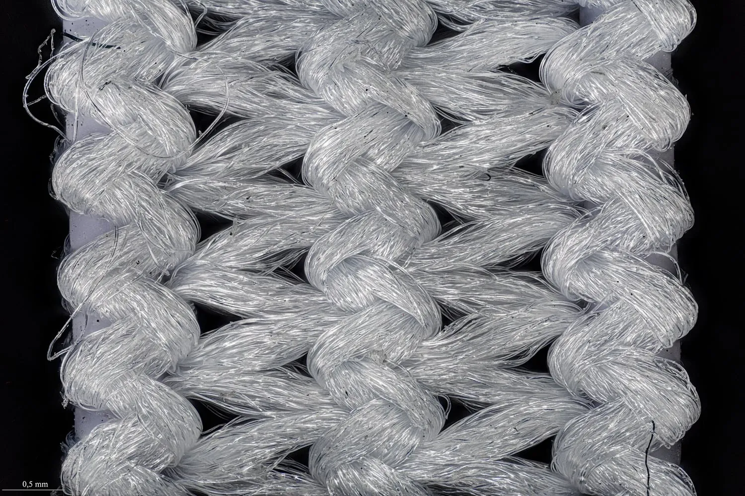 A close view of an elastic waistband with its stitching